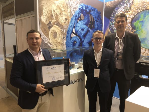 3D-SYSTEM, LLC and Solidscape holding the Silver Award to Tomasz Ogrodowski of Poland